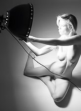 Awesome young babe having perfect body is enjoying awesome solo in the big studio with pleasure