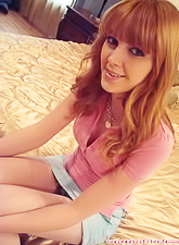 Adorable little bitch takes off her bra and starts with some nasty fun. She blows a dong so well