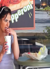 Spycam shoots a beautiful brunette babe drinking her morning coffee and eating her breakfast