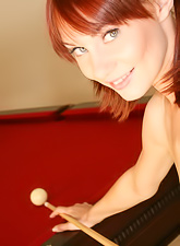 Red-haired cutie plays pool with her dude. Sure, she loses and satisfies all his desires as a debt