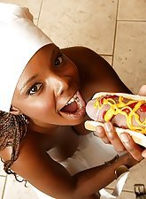 Mesh top ebony beauty gets banged by a big white dick in the kitchen