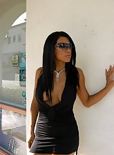 Dress-wearing ebony hottie gets fucked by a big-dicked white dude