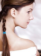 Braided teen in a white shirt finally gets naked and shows her ass