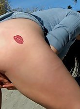 Leggy brunette teen fingering herself like crazy outdoors in a park
