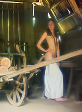 Katya B takes her sexy white dress off in the barn and shows us her amazing ass.