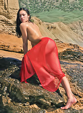 Sasha C takes her sexy red lingerie outdoors and teases us with her foxy ass.