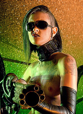 Melodie Gore dresses up as kinky apocalyptic babe and walks with a flame thrower.