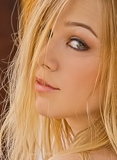 Absolutely stunning blonde model is ready to show her sexy assets and to please that hot pussy