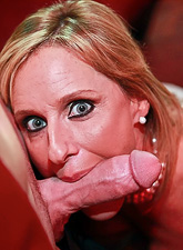 Delicious mature woman with huge natural titties sucks a huge pecker and rides it later