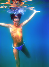 Sharon E takes her sexy bikini off underwater and shows us her amazing boobs.