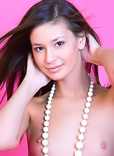 Irina J takes her sexy white dress off and teases us in sexy nylon stockings.