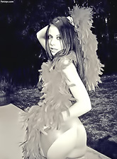 Alluring kinky bitch Penny Flame teases us outdoors in lingerie and stockings.