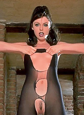 Smoking hot brunette babe Angelina Croft strips her black pantyhose and shows off.