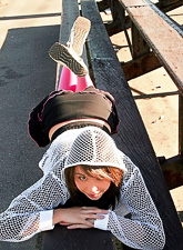 Ariel Rebel posing in her cute uniform and shows her nasty and sahved teen pussy.