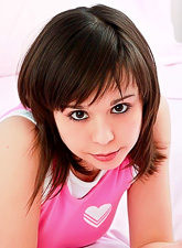 Cute solo babe, Ariel Rebel posing in her sexy pink lingerie and shws her tits.