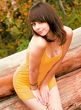 Ariel Rebel pulls down her sexy yellow dress and shows her tiny tits and ass.