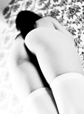 Nice and erotic, black and white photo shoot with a hot solo babe, Ariel Rebel.