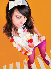 Ariel Rebel is always ready to fool around on camera in her favorite pink pantyhose.