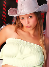 Cute and sexy solo babe, Dawson Miller gets off her shorts and shows her tits and ass.