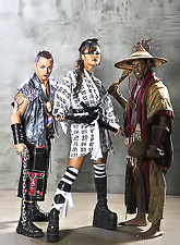 Mia Smiles turns into a horny warrior who loves both fighting and serving two dicks.