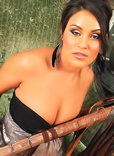 Hot brunette model Charley Chase strips her sexy dress and shows her big melons.