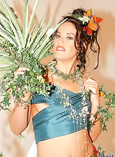 Beautiful kinky brunette Faith Adams slowly strips and shows her curvy hot body.