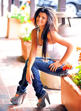 Holly Morgan takes her hot blue jeans off outdoors and shows us her amazing booty.