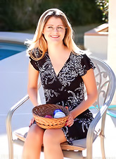 Sexy Sunny Lane opens her clean shaved pussy and stuffs it with sex toys afterwards.