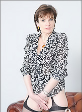 Lady Sonia strips her classy lingerie for the camera and shows us her amazing ass.