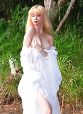 Sweet blonde Jane A shows off her pale figure adorned with perky breasts after stripping outside.