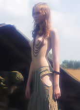 Katya B takes her green skirt outdoors in the country and shows her hot ass.