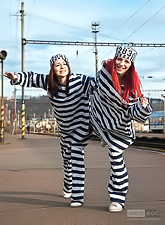 Foxy teen babe Gabrielle Lupin poses with her friend in sexy prisoner outfit.