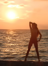 Nastya A spends her days on the beach to pose on camera and to make many photos.