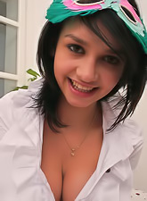 Passionate teen chick Abigail 18 strips on the bed and shows her perky boobs.