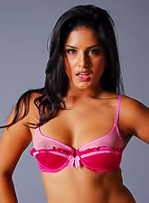 Sunny Leone takes her sexy pink lingerie before the camera and shows us her booty.