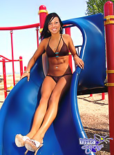 When slim Trista Stevens noticed the slide she decided to pose on camera there.