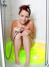 Divine Gabrielle Lupin shaves her slim legs and takes a shower without ceremony.