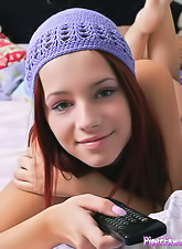 Sex-hungry Gabrielle Lupin plays with her tits, toes and slit until she is satisfied.