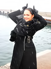 Hot brunette babe Katie Fey eats at McDonald's and then strips her black clothes.