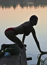 Seductive brunette vixen Felicity Fey strips outdoors and shows us her fantastic body.