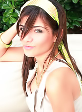 Beautiful and seductive brunette True Tere takes off her clothes and shows off.