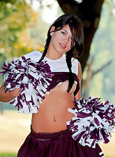 Seductive teen cheerleader Shyla Jennings strips her uniform outdoors and shows off.