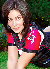 Busty teen chick Sweet Krissy takes off her shirt outdoors and shows her cupcakes.