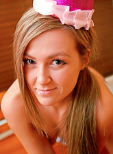 Cute blonde teen Craving Carmen takes off her panties and fucks a cock cake.