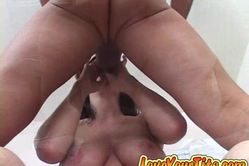 Rayveness holds her massive big breasts while she pleases her hung lover orally.