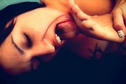 Ann Marie Rios takes all of her clothes for the camera and pleases her lover orally