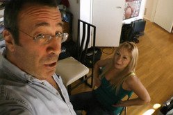 Amateur blonde babe watches porn with a mature perv before diving in to blow his stiff cock