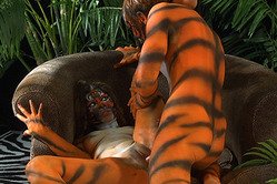 Victoria Lawson got her body painted in tiger patterned by her handsome lover