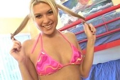 Innocent looking blonde honey with pig tails gets down on her knees to please her horny boyfriend