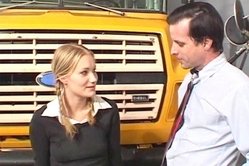 Katie Ray kneels submissively before her lover and sucks a big throbbing dong